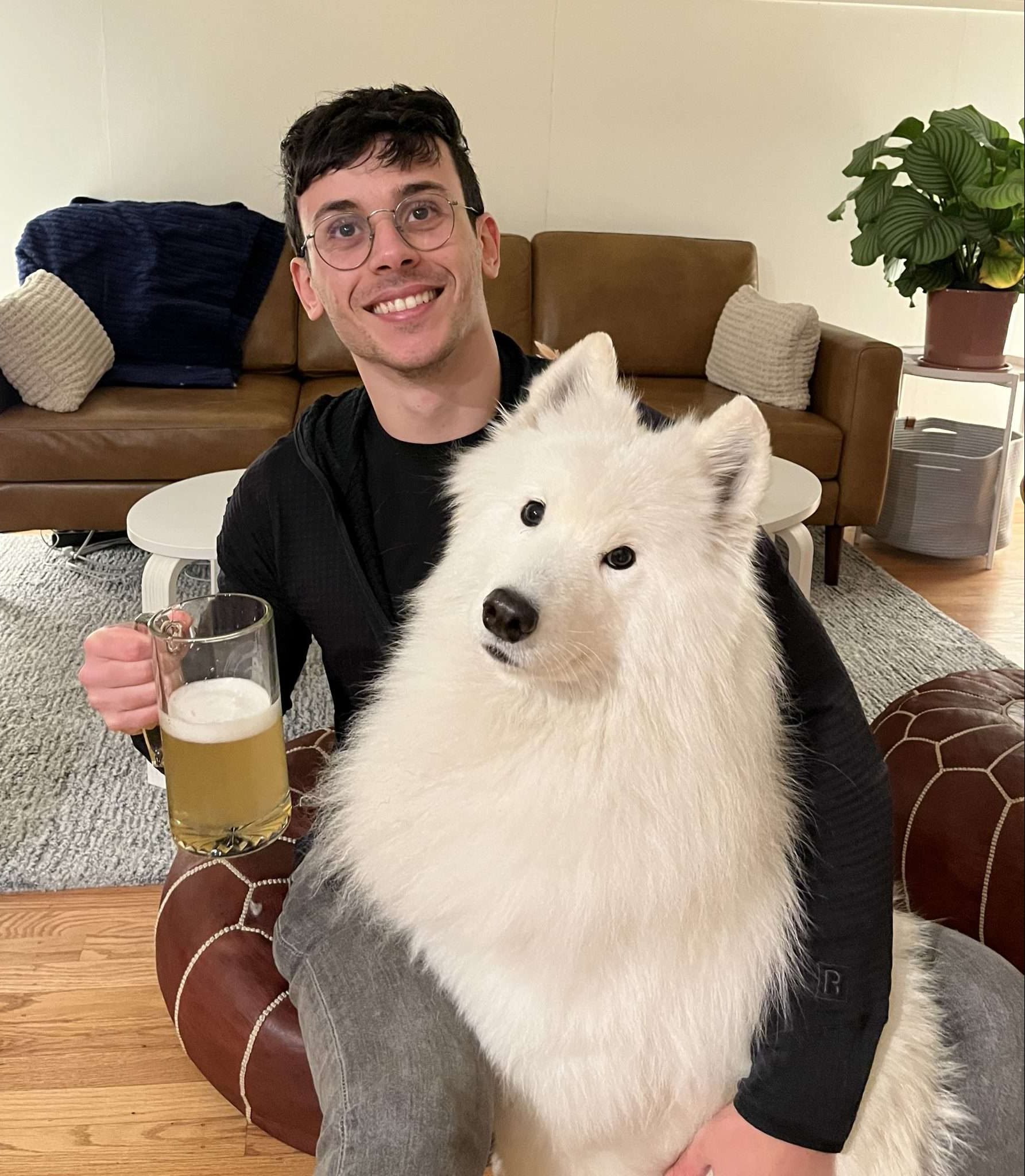 Adam Yala with their PAC-AID beer stein