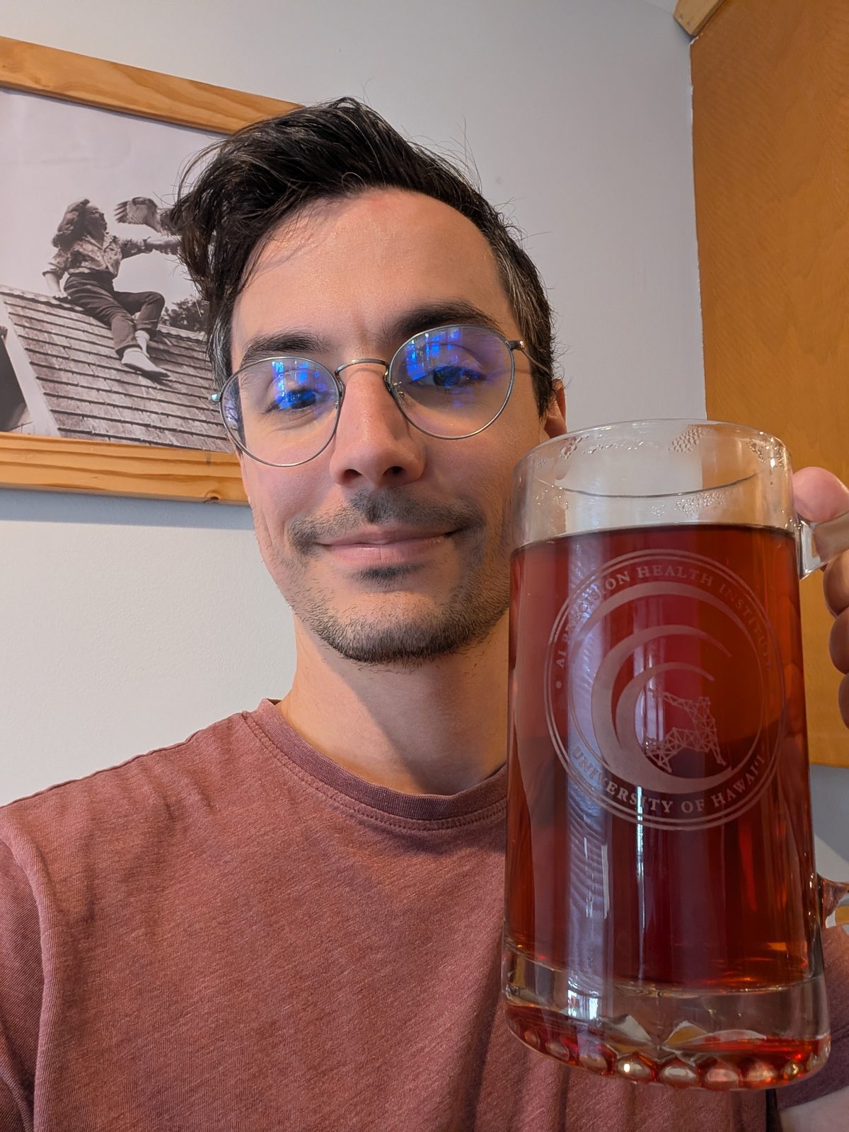 Axel Masquelin with their PAC-AID beer stein